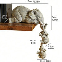 Elephant shelf decoration with stacked baby elephants.