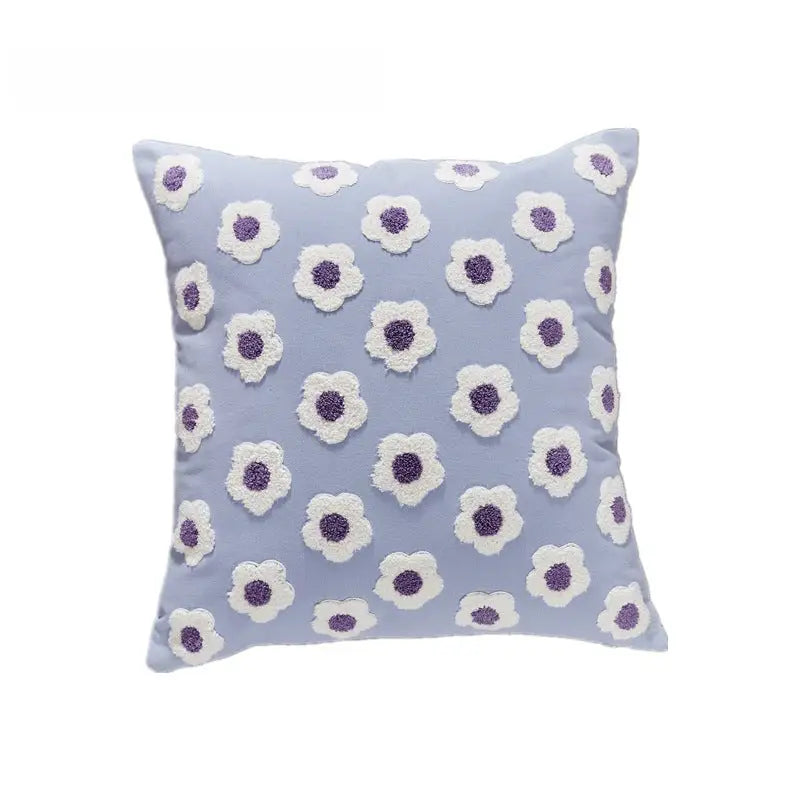 Floral-patterned decorative pillow.