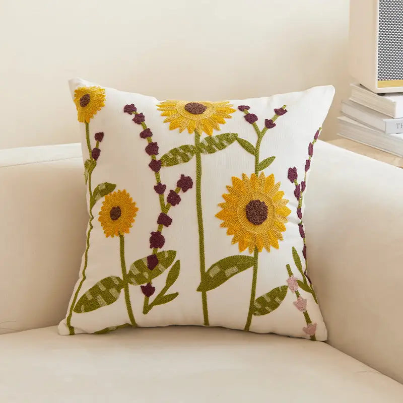 Embroidered sunflower throw pillow.