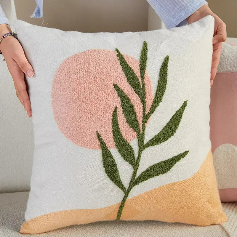 Embroidered decorative pillow.
