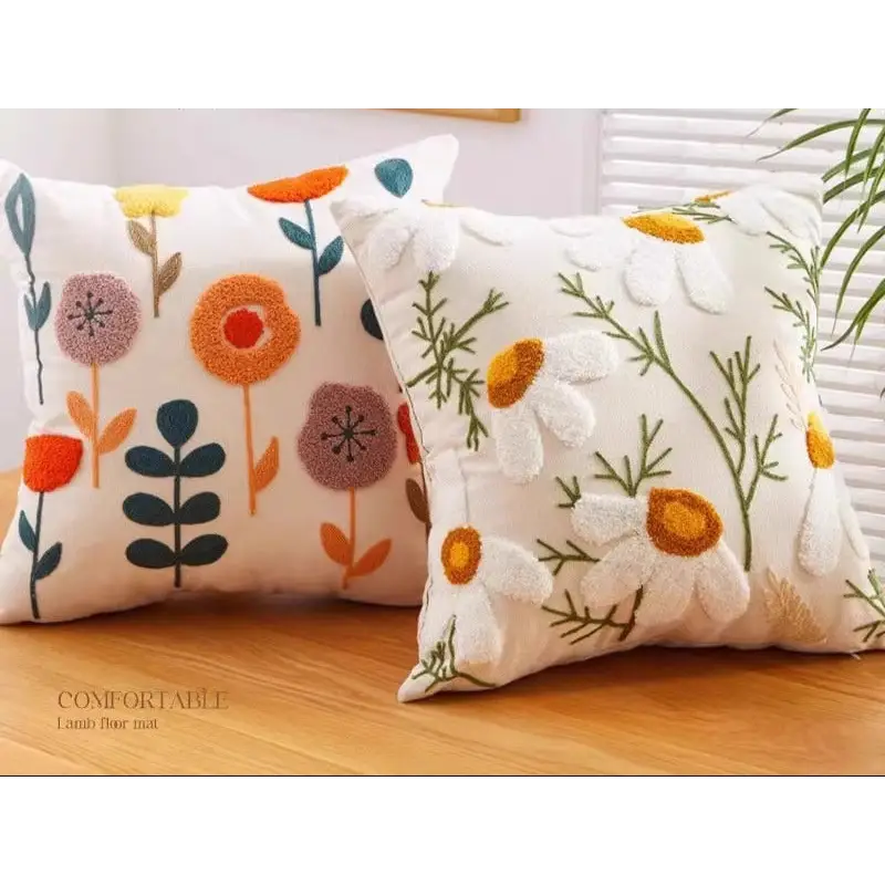 Floral embroidered throw pillows.