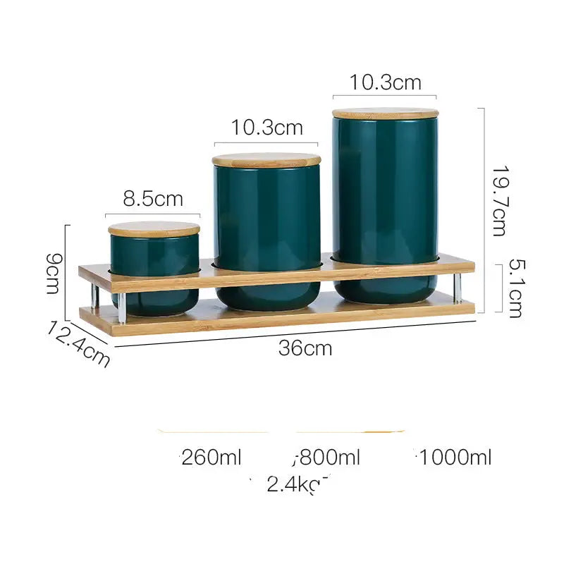 Three teal canisters on a bamboo shelf with dimensions.
