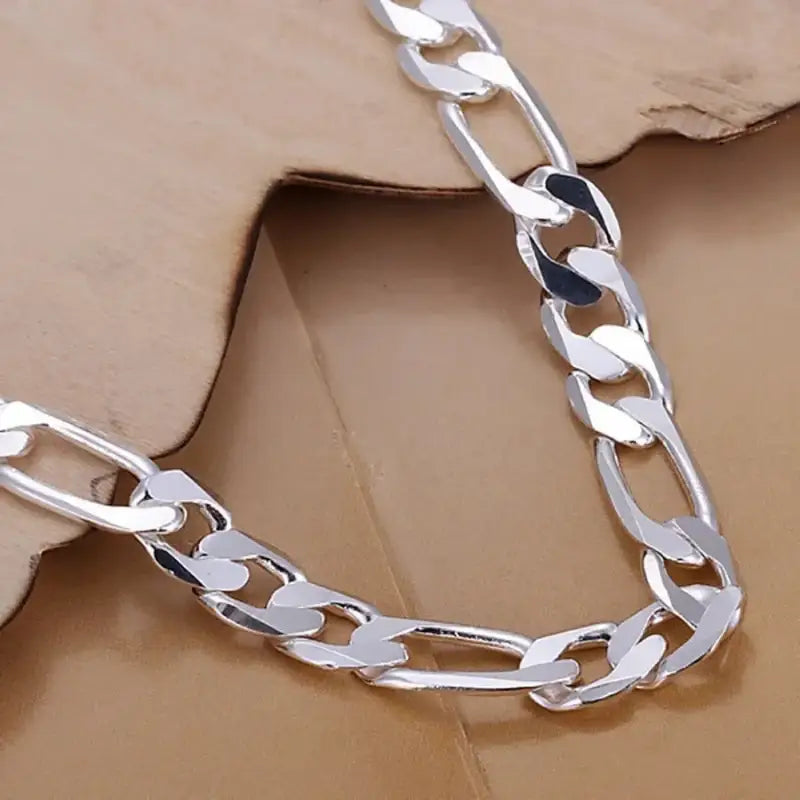 Sterling Silver Bracelet featuring a Silver Figaro Chain for elegant jewelry style