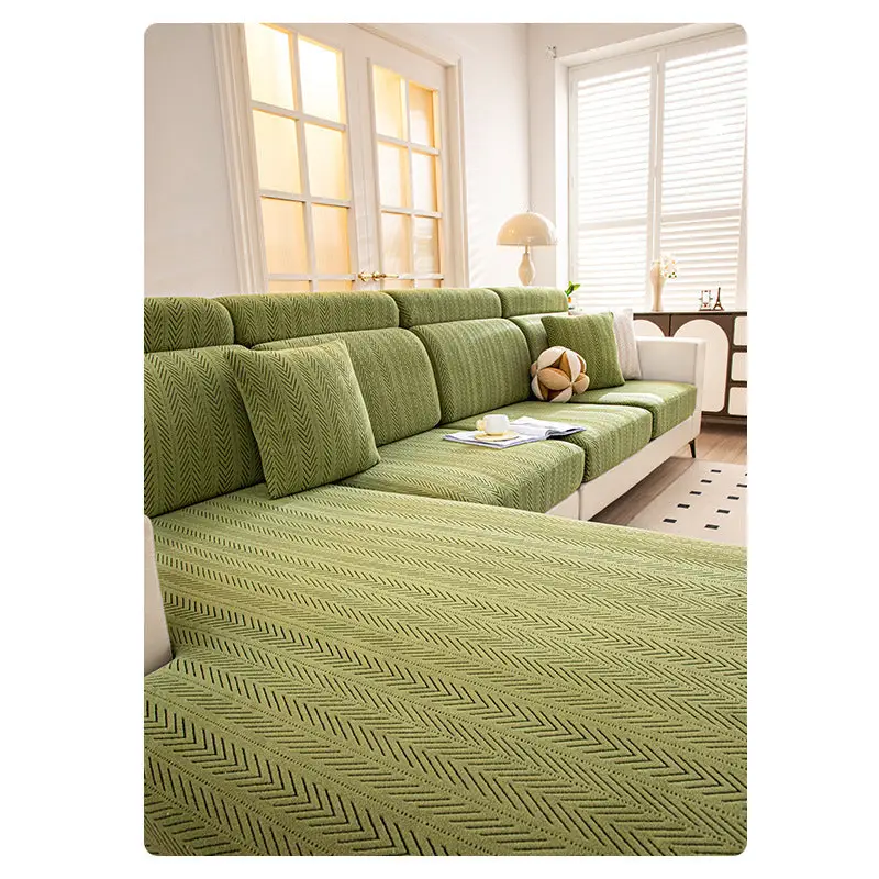 Green herringbone sectional sofa cover.