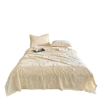 Ivory butterfly-patterned bedding.