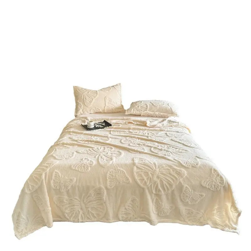 Ivory butterfly-patterned bedding.