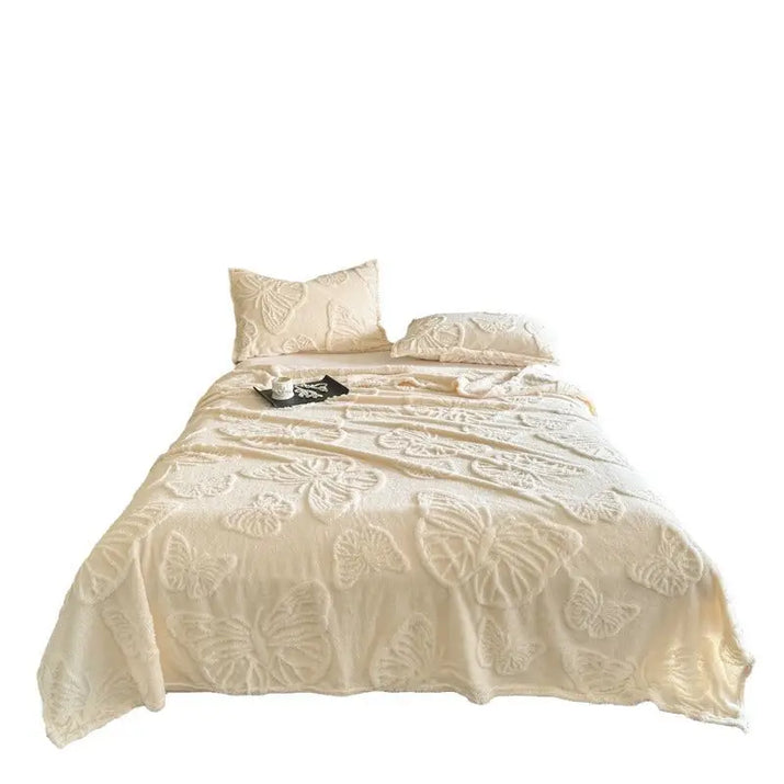 Ivory butterfly-patterned bedding.