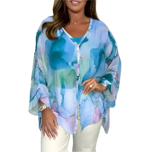 Blue and green watercolor-patterned blouse.