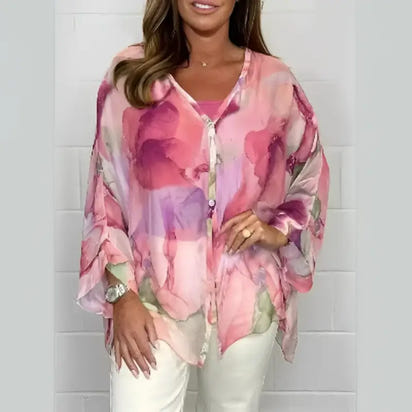 Floral print sheer blouse.