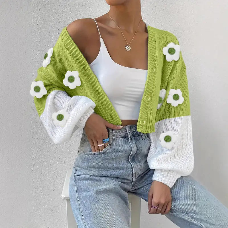 Green and white floral cardigan.