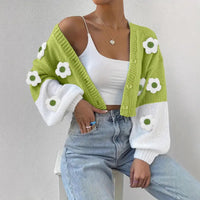 Green and white floral cardigan.