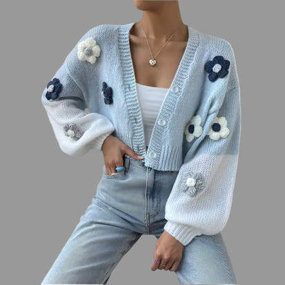 Light blue floral knit cardigan.