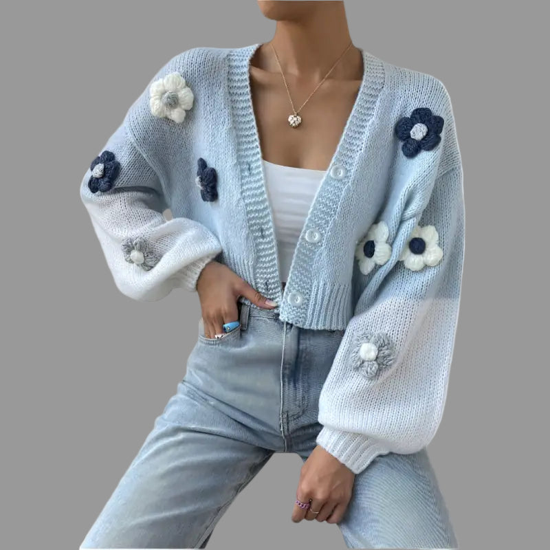 Light blue floral knit cardigan.