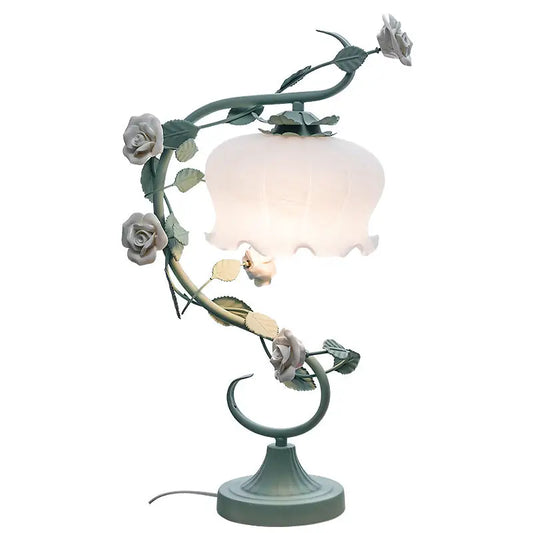 Floral-themed table lamp.