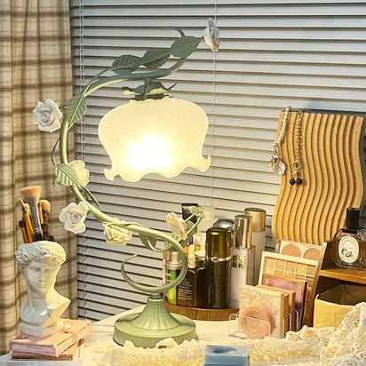 Floral-themed table lamp.