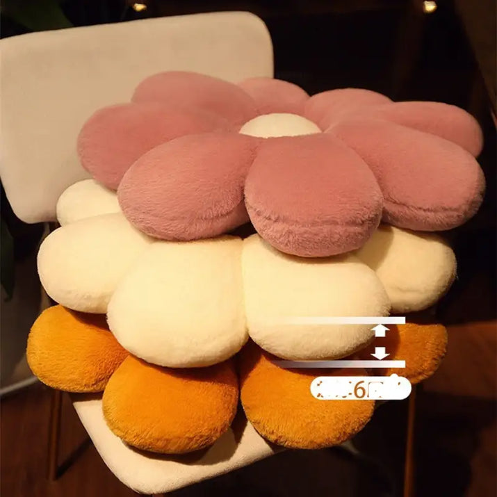 Colorful flower-shaped plush cushion.