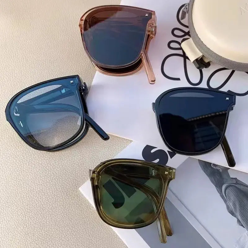 Foldable sunglasses in various colors.