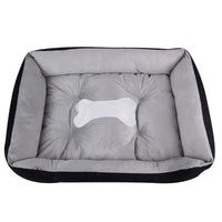 Rectangular dog bed with bone design.