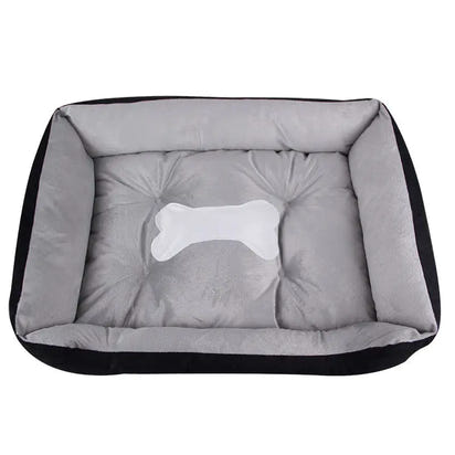 Rectangular dog bed with bone design.
