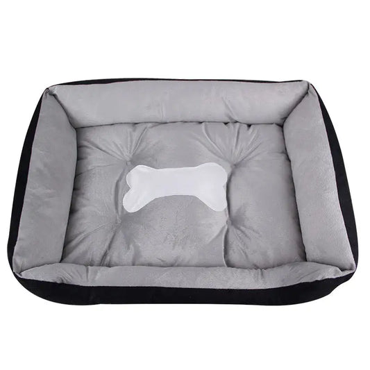 Rectangular dog bed with bone design.