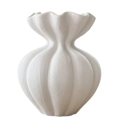 White, fluted ceramic vase.