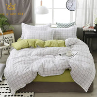 White and black grid patterned bedding.