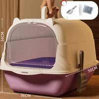 Enclosed cat litter box with scoop.