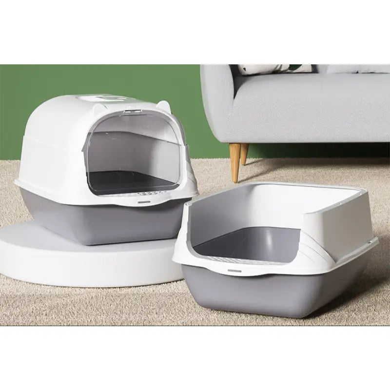 Two-tone cat litter boxes.