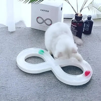 White infinity-shaped cat toy with colorful balls.