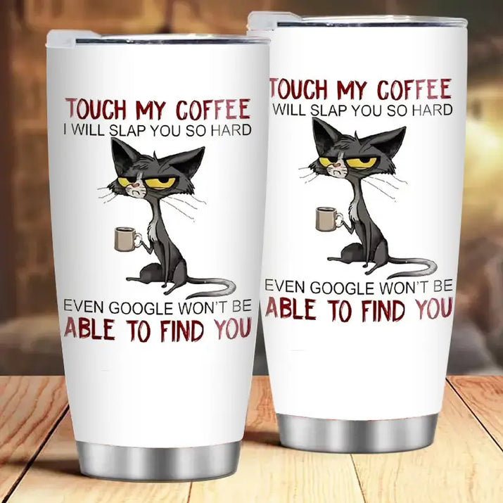 Two white tumblers with a cartoon cat design.