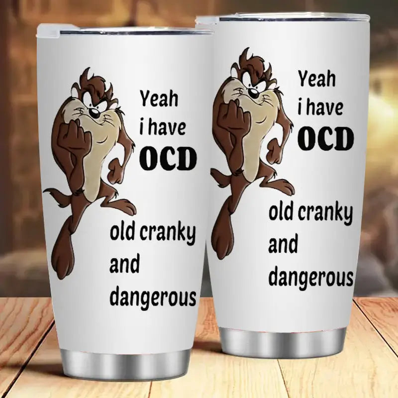 Two white tumblers with cartoon character and text.