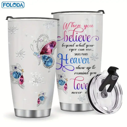 Two white tumblers with butterfly and floral designs.