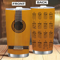 Guitar-themed tumbler with chord diagrams.