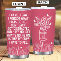 Pink tumbler with humorous text and floral design.