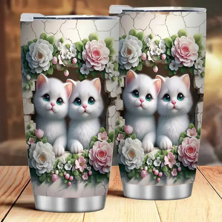 Two stainless steel tumblers with kitten and floral designs.