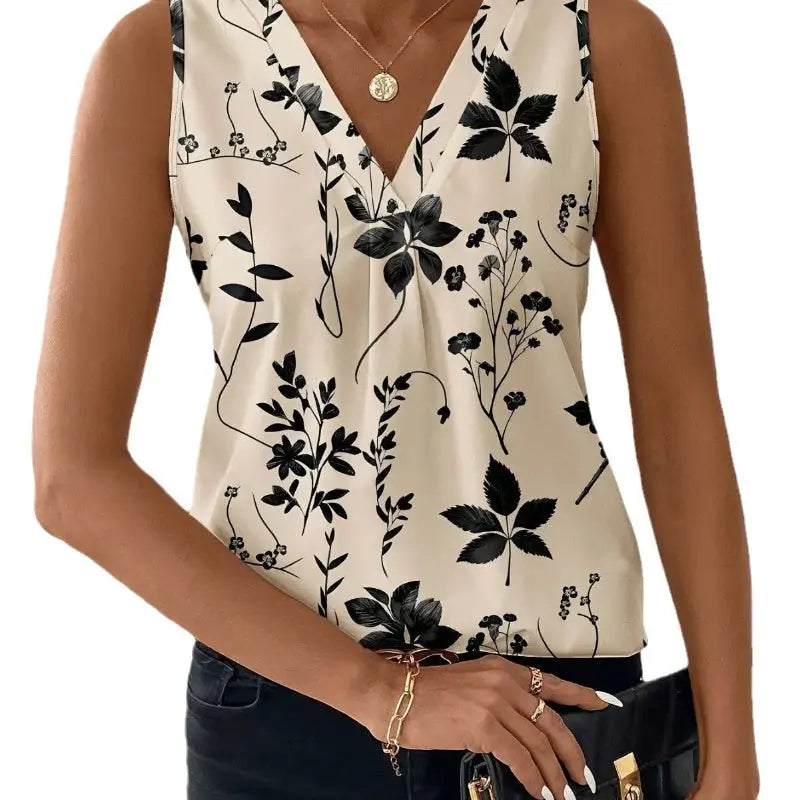 Floral print sleeveless blouse.