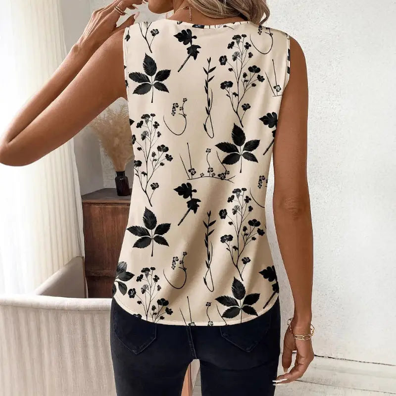 Floral-patterned sleeveless top.