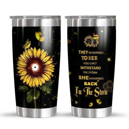 Two stainless steel tumblers with sunflower designs.