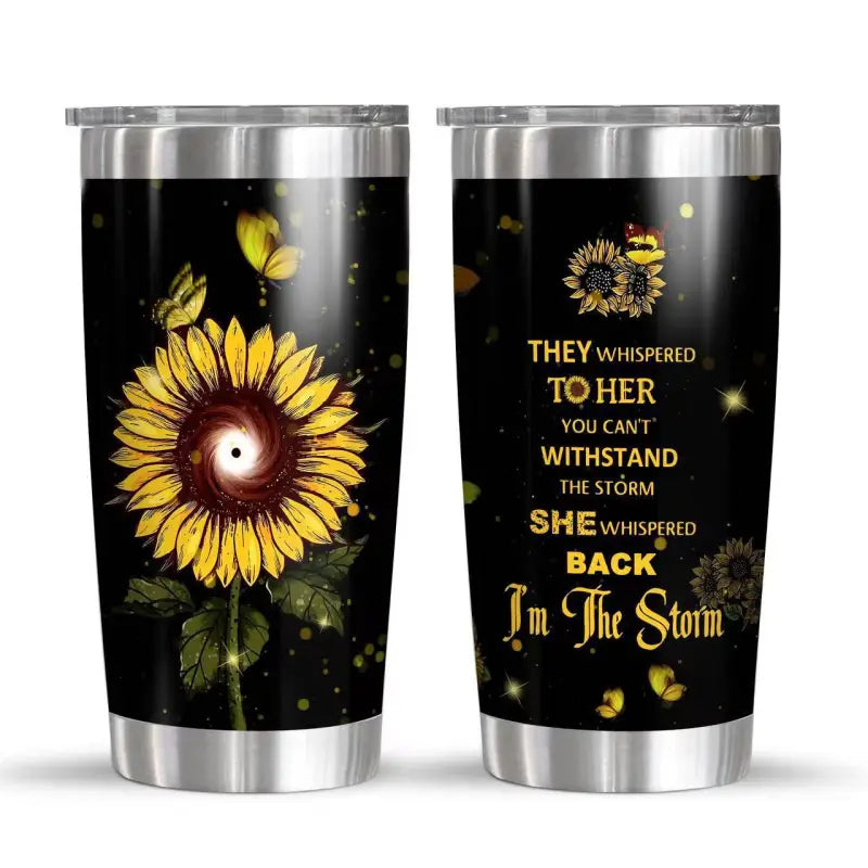 Two stainless steel tumblers with sunflower designs.