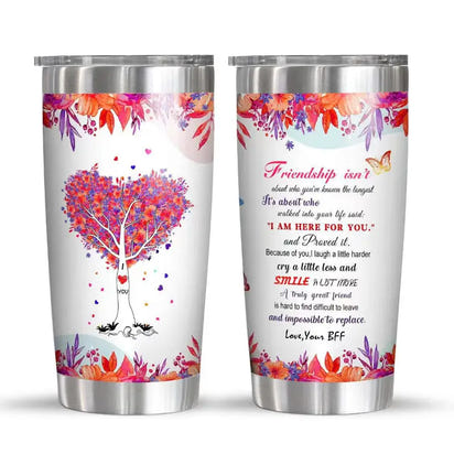 Two stainless steel tumblers with floral and heart-themed designs.