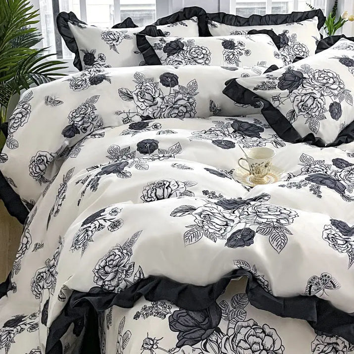 Floral-patterned bedding with ruffled trim.