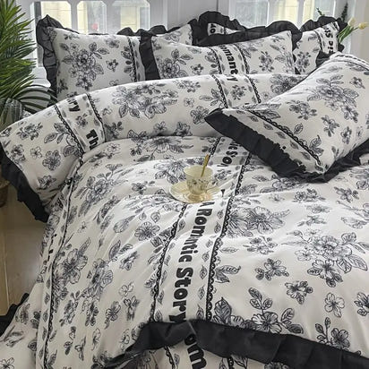 Floral patterned bedding set with ruffled trim.