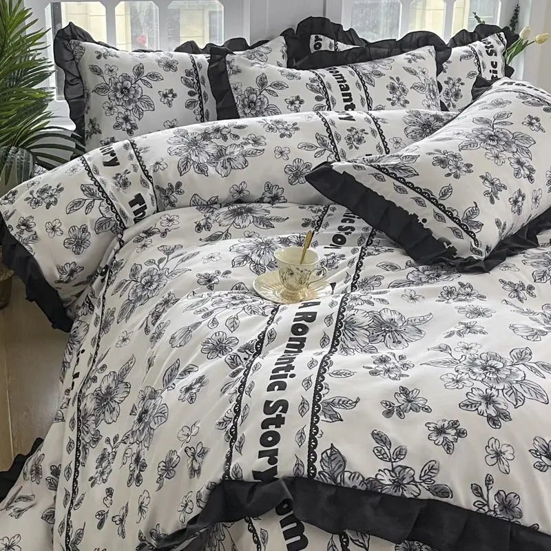 Floral patterned bedding set with ruffled trim.