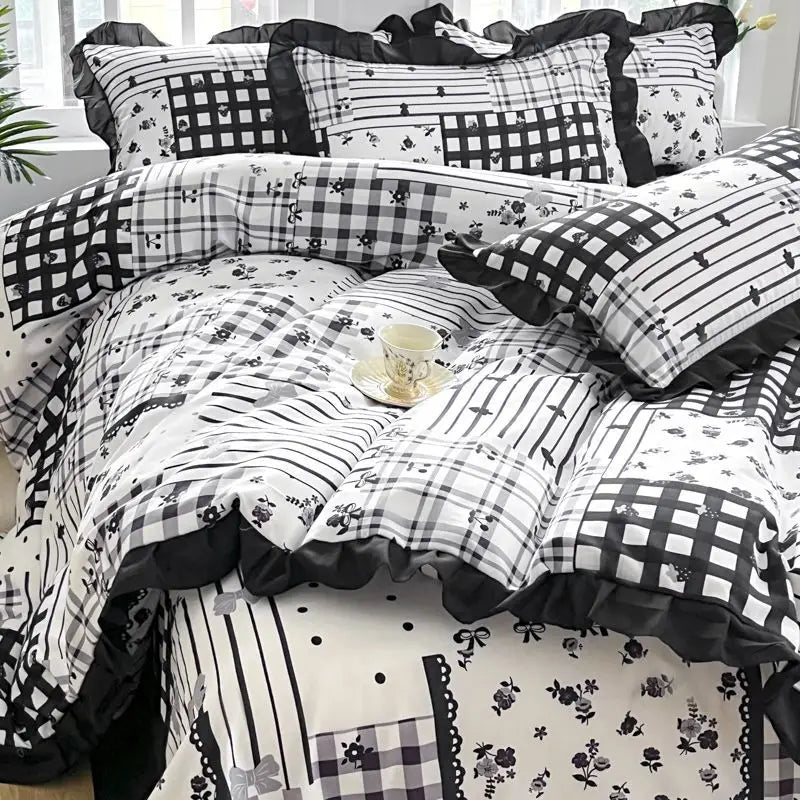 Black and white patchwork bedding.