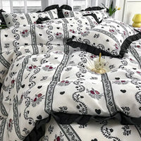 Floral and heart patterned bedding.