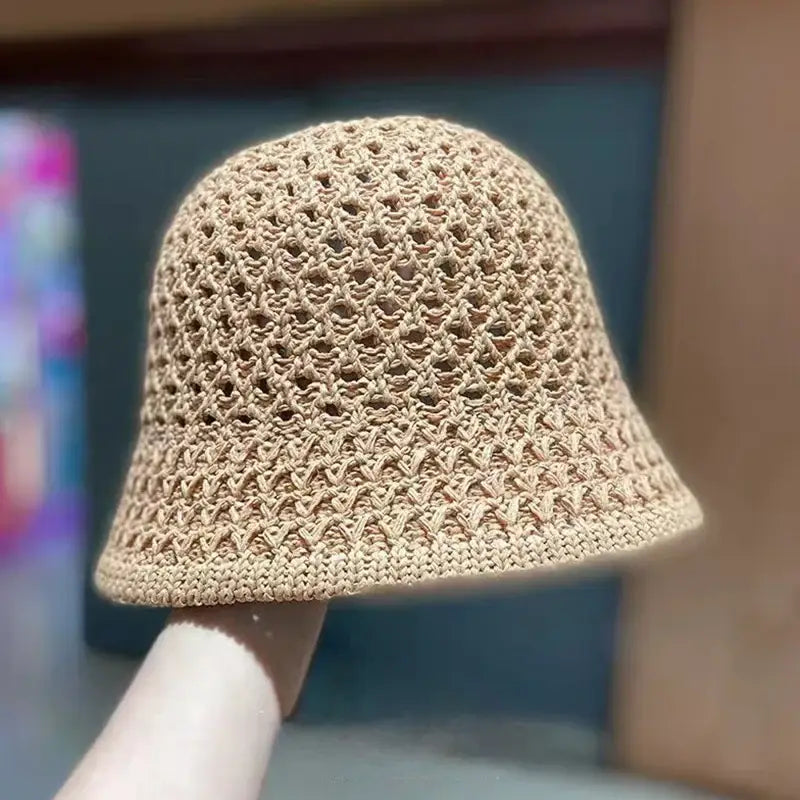 Beige crocheted bucket hat.