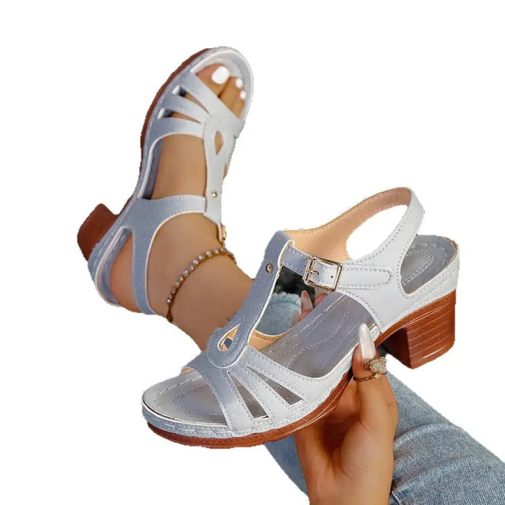 Gray leather heeled sandals.