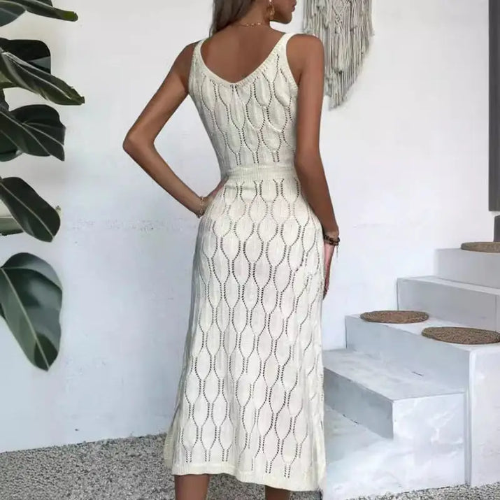 Cream-colored knit dress.