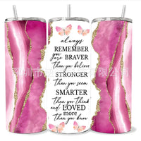 Three tumblers with inspirational messages and pink marble designs.