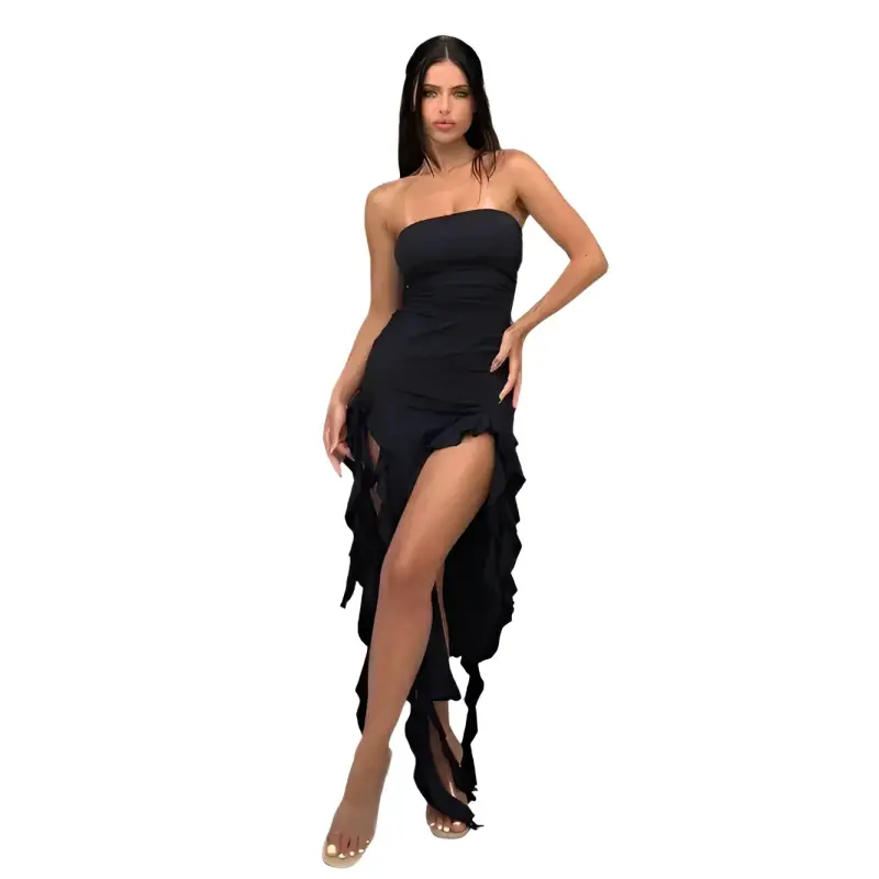 Black strapless dress with high slit.